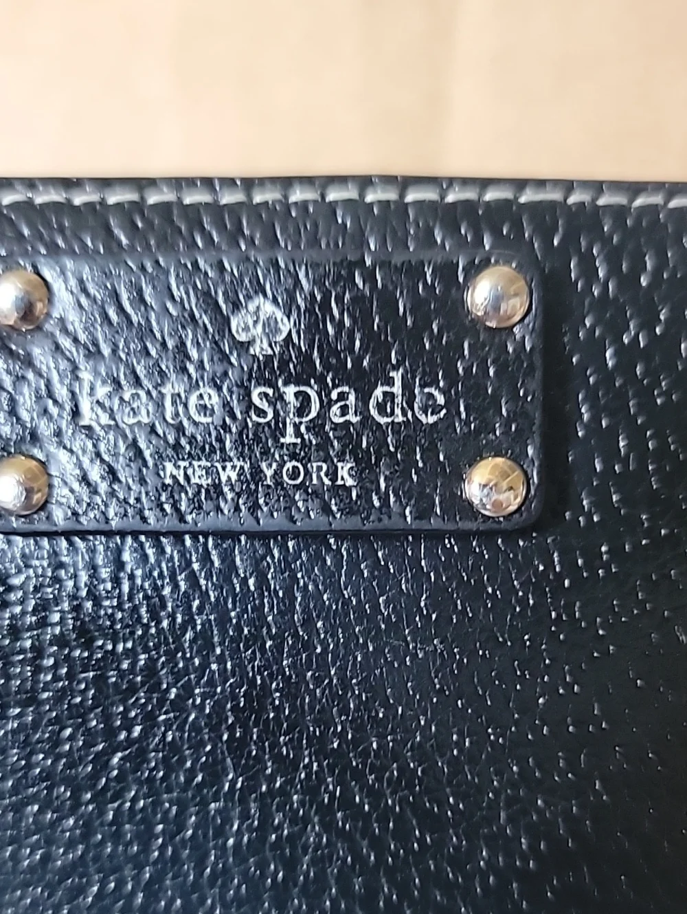 kate spade Black Pebbled Zip-Around Wallet with Gold Hardware